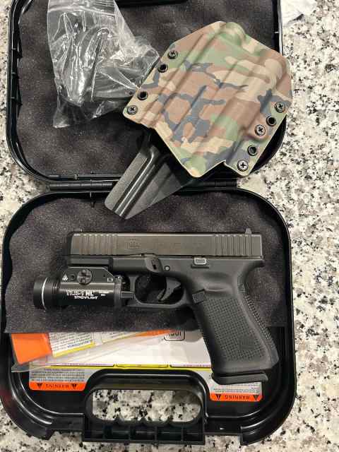 Glock 19 w/tlr 1 and owb holster 