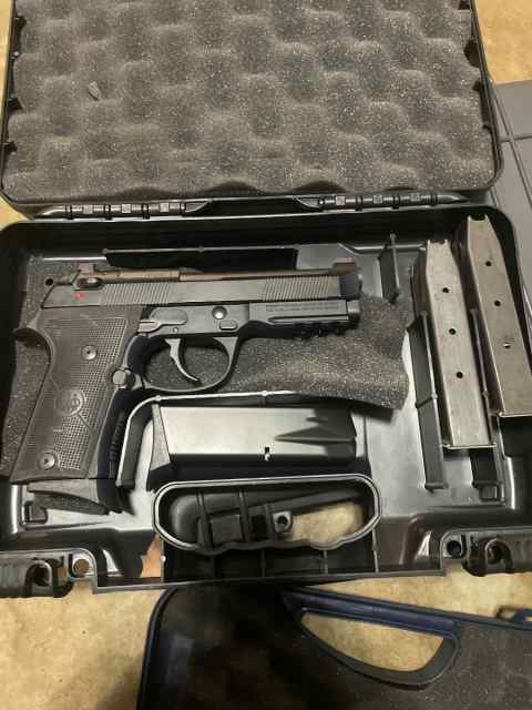 2-Berettas 9mm and 45