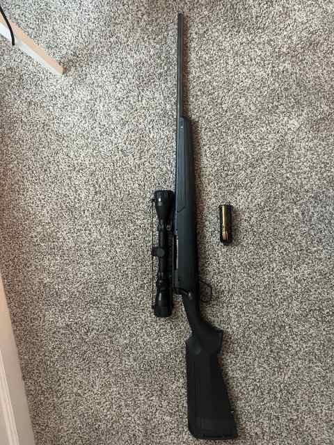 Savage Axis 30-06 scoped rifle for sale 