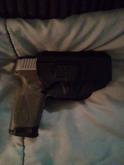 Taurus G3 with 18 round mag and retention holster.